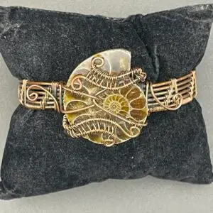 Hand-Wrapped Copper Wire Cuff Bracelet Featuring A Detailed Ammonite Fossil