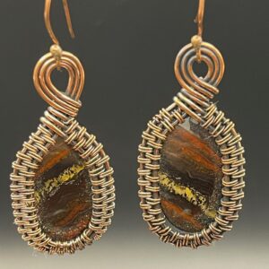Hand-wrapped copper wire earrings featuring iron tiger's eye with striking, layers  that blend metallic shimmers with earthy tones.