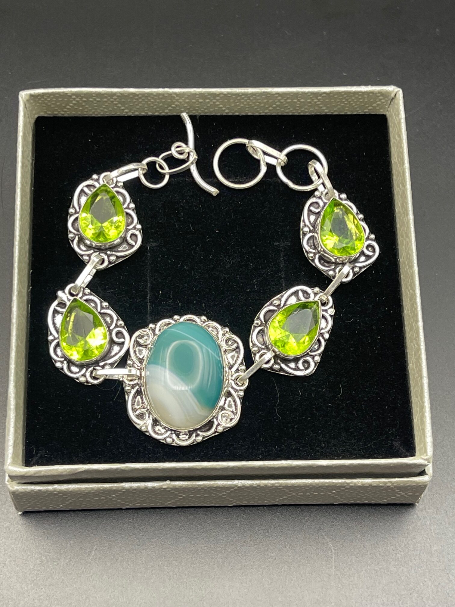 Botswana Agate Peridot in Handmade Silver Plated Bracelet 3 in Square Box rotated - Botswana Agate & Peridot in Handmade Silver Plated Bracelet, 3 in Square Box - Botswana Agate & Peridot in Handmade Silver Plated Bracelet, 3 in Square Box - AURORA ARTISAN JEWELLERY