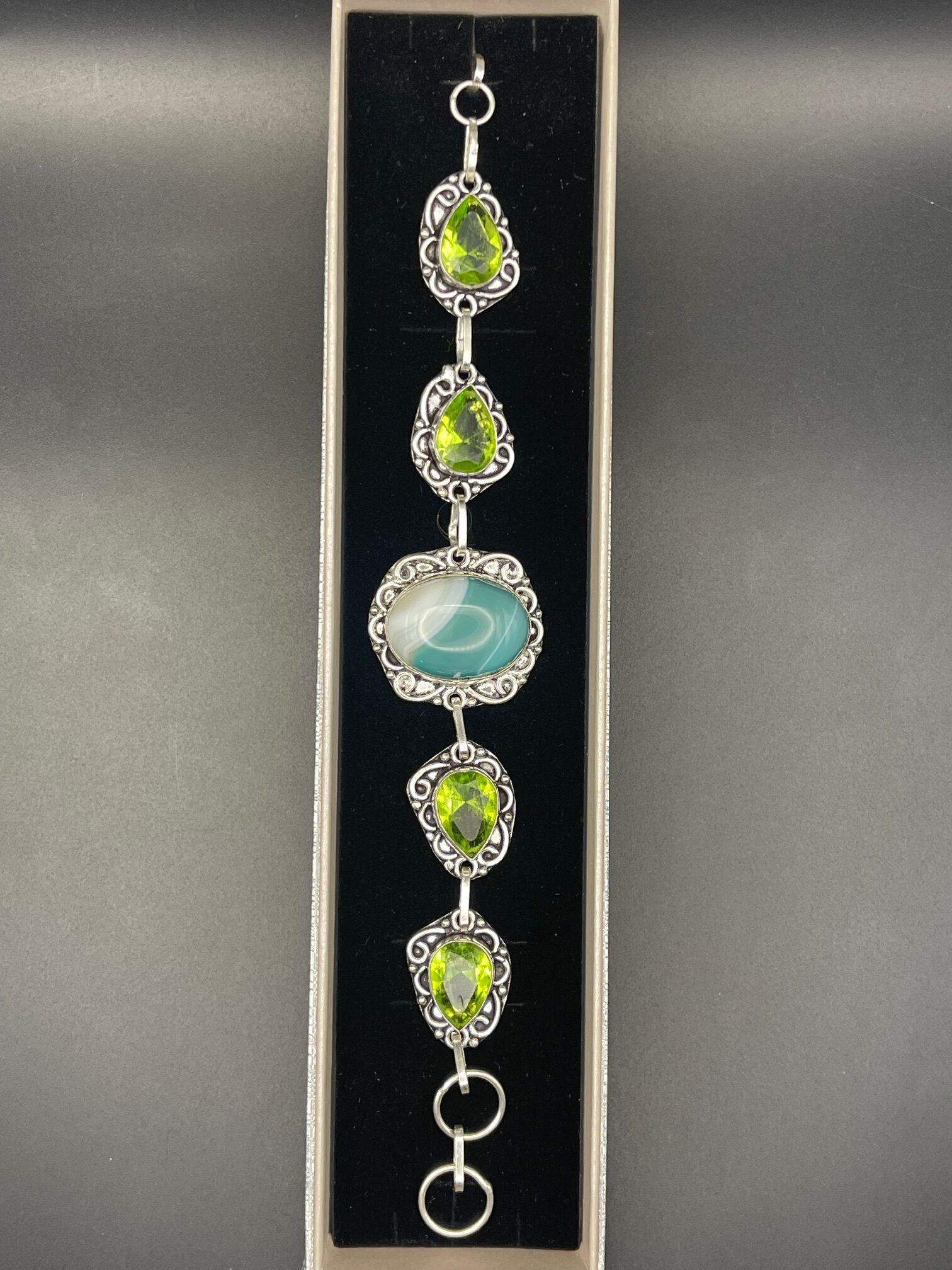 Botswana Agate Peridot in Handmade Silver Plated Bracelet 4 in Rectangular Box rotated - Botswana Agate & Peridot in Handmade Silver Plated Bracelet, 4 in Rectangular Box - Botswana Agate & Peridot in Handmade Silver Plated Bracelet, 4 in Rectangular Box - AURORA ARTISAN JEWELLERY