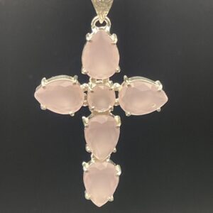 Pretty soft pink rose chalcedony set within an elegant handmade silver plated cross pendant.