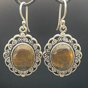 Shimmering Tiger's Eye in rich honey and chocolate brown tones set within decorative handmade silver plated drop earrings with hooks